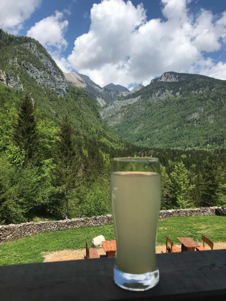 Glass of lemonade with mountain views