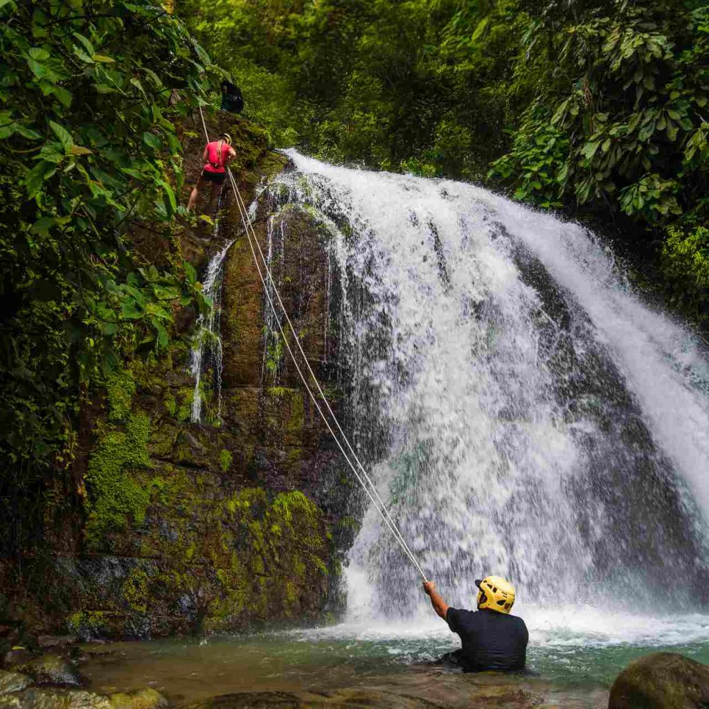 Navigating a waterfall drop Costa Rica Cayuga